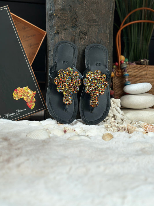 Nataki fekete bőr színes nagy virág mintás afrikai papucs lapos talppal újjbebújós flip-flop
