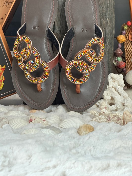 Nomsa barna bőr színes 3 körös mintás afrikai papucs lapos talppal újjbebújós flip-flop